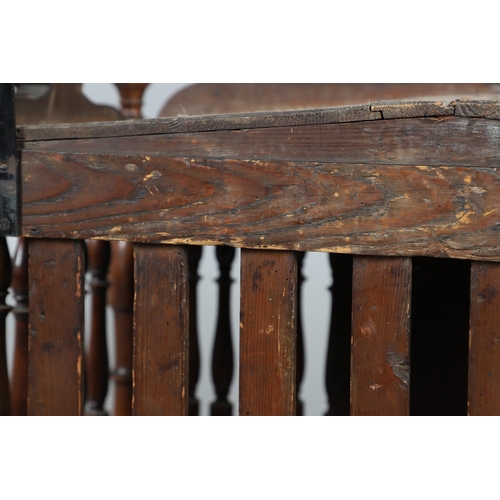 536 - AN ANTIQUE FRENCH FRUITWOOD FOOD HUTCH. open turned spindles joined by a scroll carved apron, fitted... 