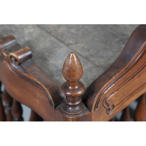 536 - AN ANTIQUE FRENCH FRUITWOOD FOOD HUTCH. open turned spindles joined by a scroll carved apron, fitted... 