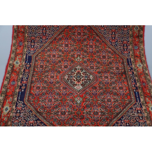 539 - BIDJAR RUG, 2ND HALF 20TH CENTURY. the Herati lozenge field with mint green medallion framed by span... 