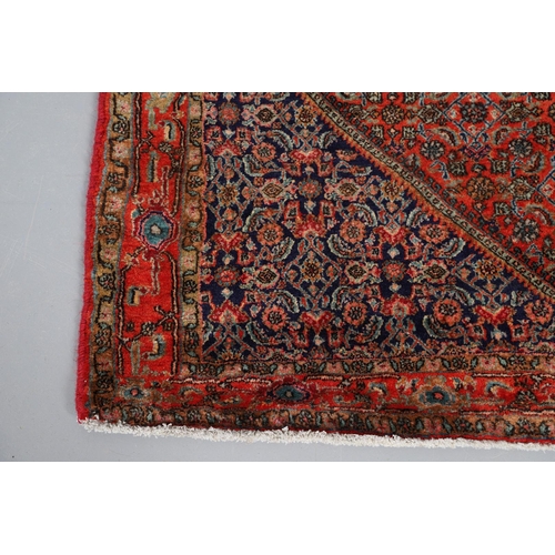 539 - BIDJAR RUG, 2ND HALF 20TH CENTURY. the Herati lozenge field with mint green medallion framed by span... 