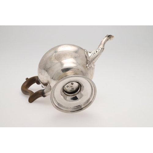 98 - A GEORGE III SILVER TEA POT. of inverted baluster form, with a scroll handle, engraved decoration ar... 
