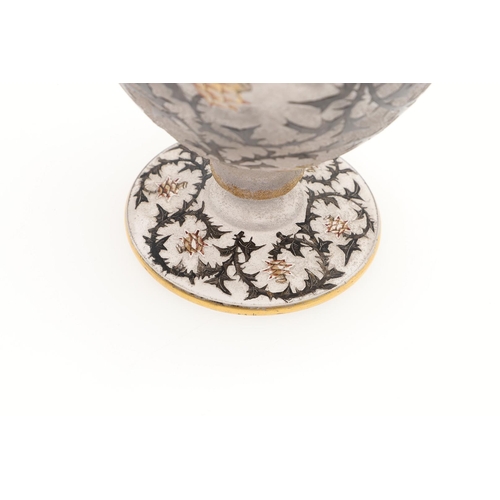 652 - DAUM NANCY - 'THISTLE' CAMEO GLASS VASE. A cameo vase of ovoid form with a circular foot, enamelled ... 