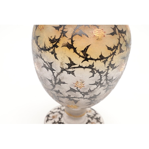 652 - DAUM NANCY - 'THISTLE' CAMEO GLASS VASE. A cameo vase of ovoid form with a circular foot, enamelled ... 