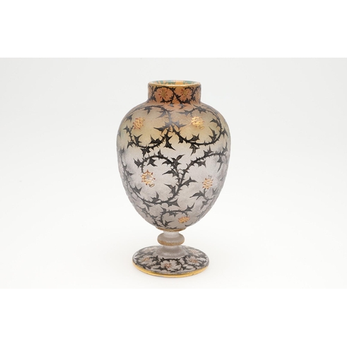 652 - DAUM NANCY - 'THISTLE' CAMEO GLASS VASE. A cameo vase of ovoid form with a circular foot, enamelled ... 