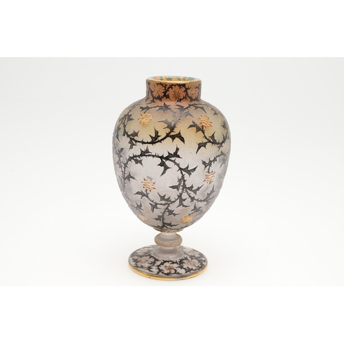 652 - DAUM NANCY - 'THISTLE' CAMEO GLASS VASE. A cameo vase of ovoid form with a circular foot, enamelled ... 