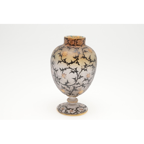 652 - DAUM NANCY - 'THISTLE' CAMEO GLASS VASE. A cameo vase of ovoid form with a circular foot, enamelled ... 