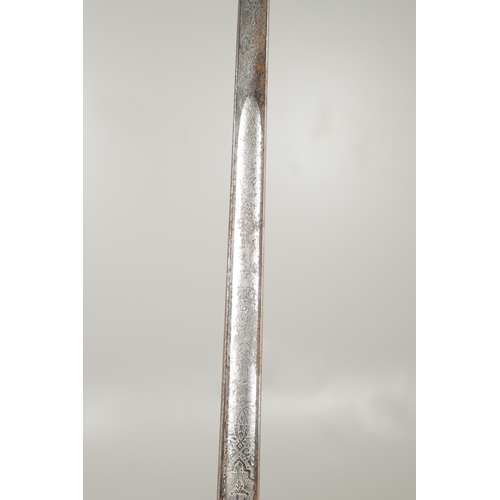 101 - A ROYAL FUSILIERS 1897 PATTERN SWORD AND SCABBARD. An 1897 Pattern Officers sword with an 82cm point... 