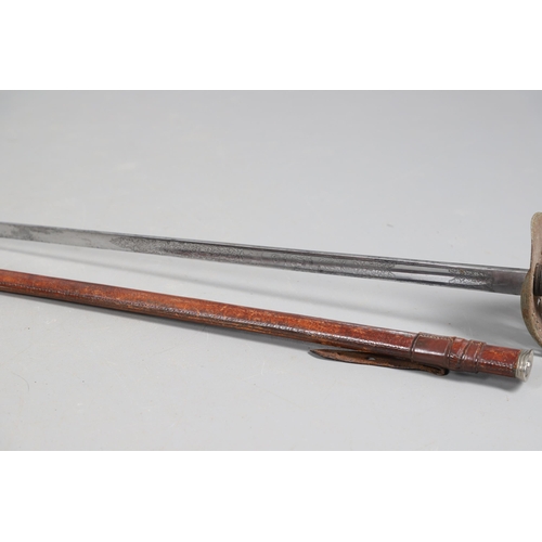 103 - A GEORGE V 1897 PATTERN SERGEANTS SWORD AND SCABBARD. With an 82 cm tapering, pointed blade with etc... 