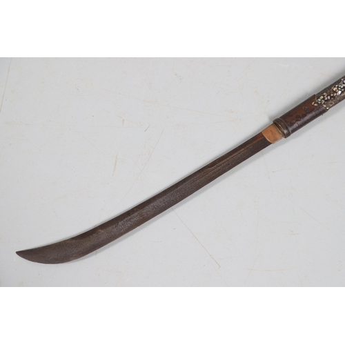 115 - A 19TH CENTURY JAPANESE SAMURAI NAGINATA POLEARM SWORD. With a 35.5 cm hooked blade mounted on a mot... 