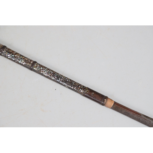 115 - A 19TH CENTURY JAPANESE SAMURAI NAGINATA POLEARM SWORD. With a 35.5 cm hooked blade mounted on a mot... 