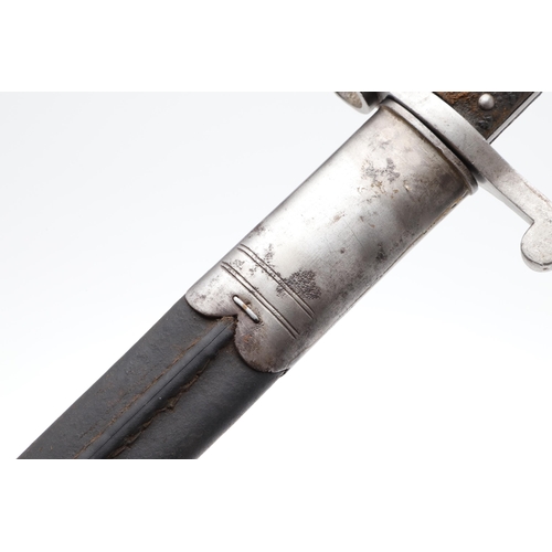 128 - A VICTORIAN MARTINI HENRY 1887 PATTERN BAYONET AND SCABBARD. With a 46 cm pointed single edged blade... 