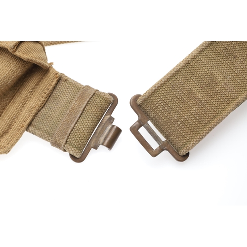 14 - A 1937 PATTERN WEBBING HOLSTER, POUCH AND BELT. A webbing belt with a Webley holster marked M.E.C.o.... 