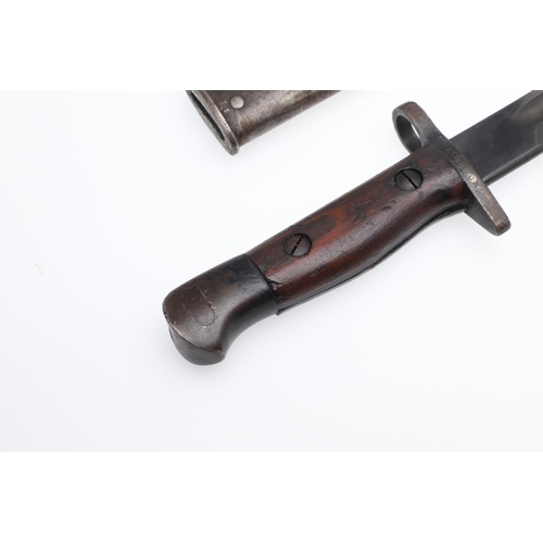 140 - A 1907 PATTERN BAYONET AND SCABBARD. DATED 1907 AND 1919. With a 43 cm pointed, single edged blade w... 