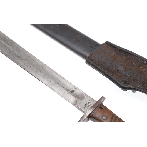 145 - A FIRST WORLD WAR GERMAN 'BUTHCER' BAYONET AND SCABBARD. A First World War German M1898 bayonet with... 