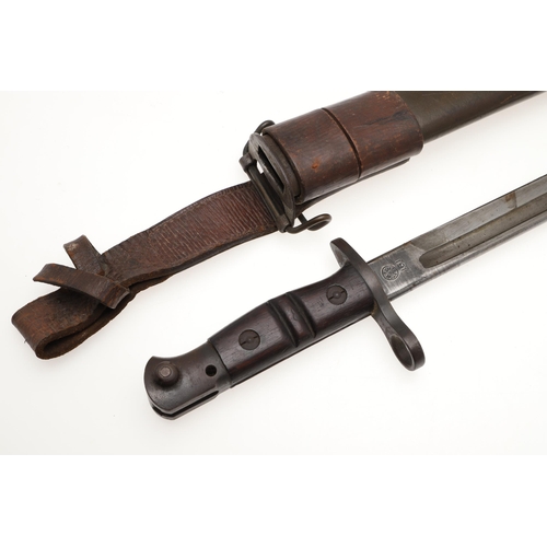 152 - AN AMERICAN REMINGTON FIRST WORLD WAR 1917 PATTERN BAYONET AND SCABBARD. A 1917 pattern bayonet with... 