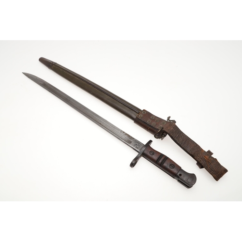 152 - AN AMERICAN REMINGTON FIRST WORLD WAR 1917 PATTERN BAYONET AND SCABBARD. A 1917 pattern bayonet with... 