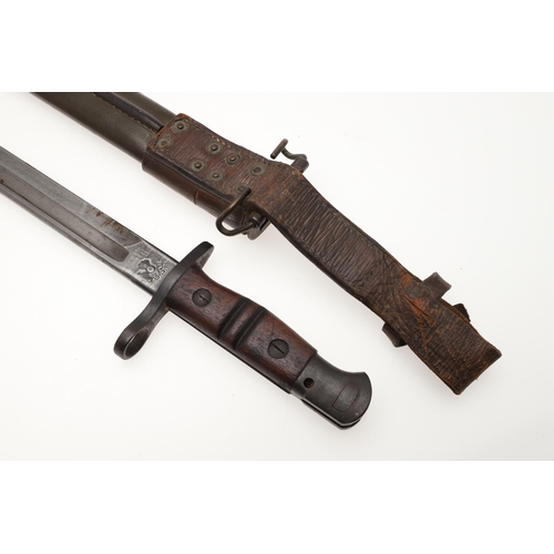 152 - AN AMERICAN REMINGTON FIRST WORLD WAR 1917 PATTERN BAYONET AND SCABBARD. A 1917 pattern bayonet with... 