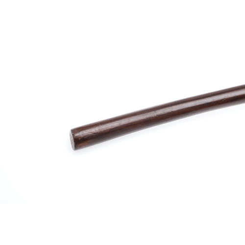 157 - AN ANTIQUE ZULU KNOBKERRIE. A large hardwood knobkerrie with round head on a long shaft. 65 cm long,... 