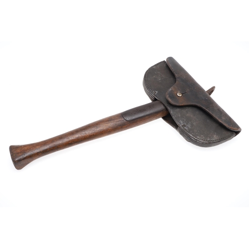 159 - A MERRYWEATHER FIREMAN'S AXE AND LEATHER COVER. With a 19 cm wide blade with 6.5 cm cutting edge, ma... 