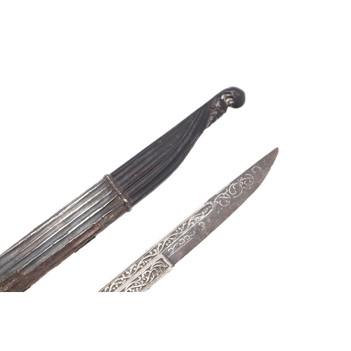 165 - A FINELY DECORATED SINHALESE PIHA KAETTA KNIFA. A traditional Sri Lankan dagger with a 14 cm blade w... 