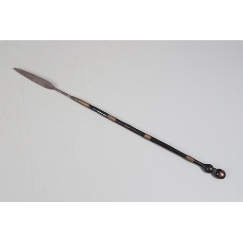 167 - A 19TH CENTURY SOUTH AFRICAN ASSAGAI OR STABBING SPEAR. With a 24.5 cm leaf shaped blade on a decora... 