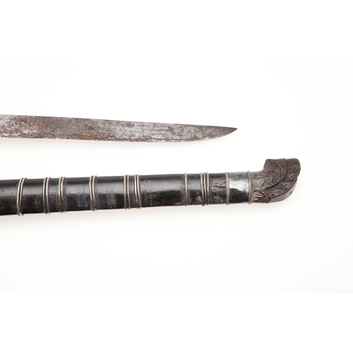 170 - A MALAYAN KRIS WITH CARVED HANDLE AND MOUNTED SCABBARD. ALSO AN AXE. A Malayan Kris with a 24.5 cm s... 