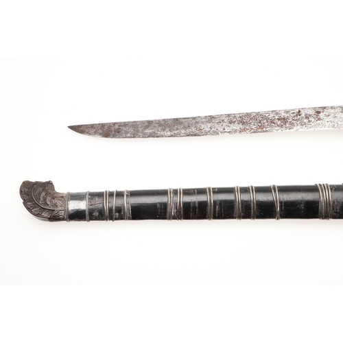 170 - A MALAYAN KRIS WITH CARVED HANDLE AND MOUNTED SCABBARD. ALSO AN AXE. A Malayan Kris with a 24.5 cm s... 