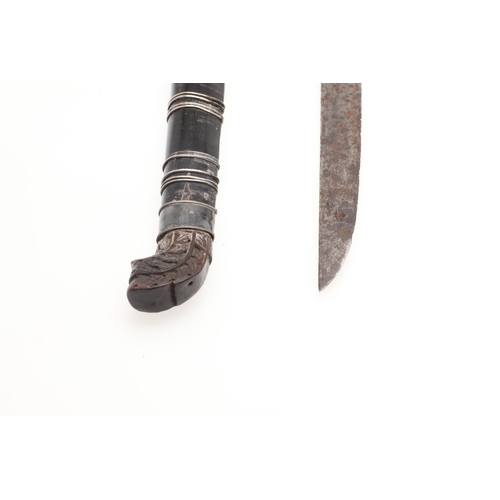 170 - A MALAYAN KRIS WITH CARVED HANDLE AND MOUNTED SCABBARD. ALSO AN AXE. A Malayan Kris with a 24.5 cm s... 