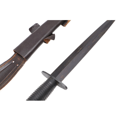 178 - A THIRD PATTERN FAIRBURN SYKES TYPE FIGHTING KNIFE. With a 17 cm double edged, pointed blade, with r... 