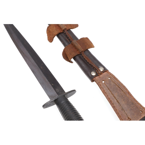 178 - A THIRD PATTERN FAIRBURN SYKES TYPE FIGHTING KNIFE. With a 17 cm double edged, pointed blade, with r... 