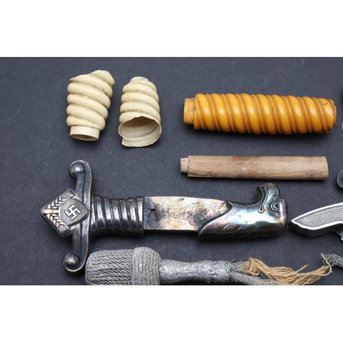 185 - AN INTERESTING AND USEFUL COLLECTION OF SECOND WORLD WAR GERMAN DAGGER PARTS. An interesting collect... 