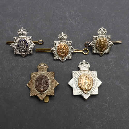 188 - A FINE KING'S DRAGOON GUARDS OFFICERS SMALL SILVER BADGE AND A SIMILAR OTHER RANKS SET. An Officer's... 