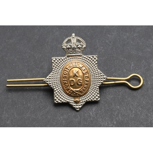 188 - A FINE KING'S DRAGOON GUARDS OFFICERS SMALL SILVER BADGE AND A SIMILAR OTHER RANKS SET. An Officer's... 