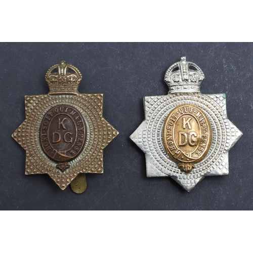 188 - A FINE KING'S DRAGOON GUARDS OFFICERS SMALL SILVER BADGE AND A SIMILAR OTHER RANKS SET. An Officer's... 