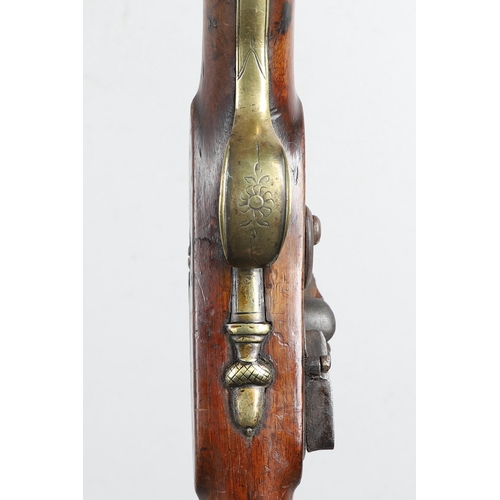 19 - A LATE 18TH CENTURY FLINTLOCK GUN BY MORRIS. With a 94cm tapering barrel with proof marks and decora... 