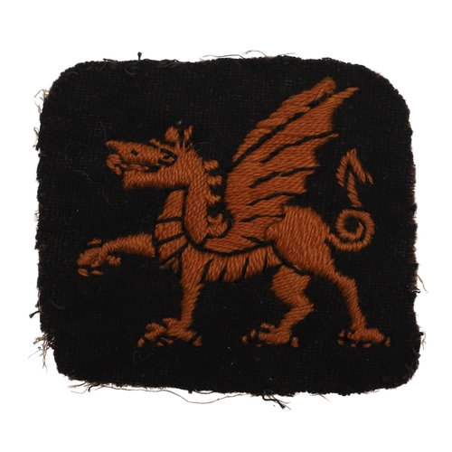 197 - A FIRST WORLD WAR 38TH WELSH DIVISION ARM PATCH. A 38th Division (Welsh) Arm Patch with a red dragon... 