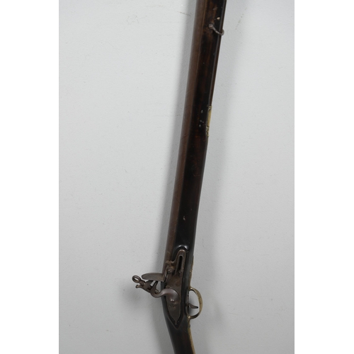 20 - A FLINTLOCK MUSKETOON BY GRIFFIN OF LONDON. A Musketoon with a 76cm flared barrel marked with a star... 