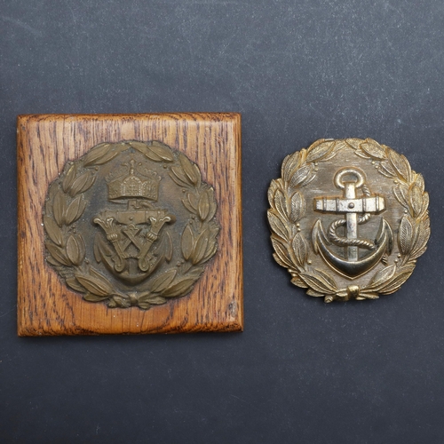 204 - A SECOND WORLD WAR GERMAN KRIEGSMARINE OFFICER'S BELT BUCKLE AND A SIMILAR FIRST WORLD WAR EXAMPLE. ... 