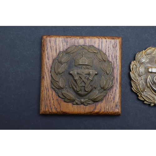 204 - A SECOND WORLD WAR GERMAN KRIEGSMARINE OFFICER'S BELT BUCKLE AND A SIMILAR FIRST WORLD WAR EXAMPLE. ... 