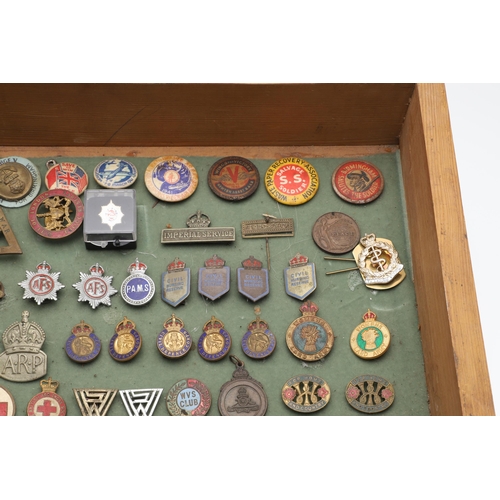 206 - AN INTERESTING COLLECTION OF MILITARY RELATED ENAMEL AND SIMILAR BADGES. A collection of 89 badges t... 