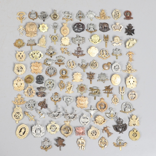 209 - A COLLECTION OF APPROXIMATELY 100 CAP BADGES TO INCLUDE SOUTH LANCASHIRE AND OTHERS. A collection of... 