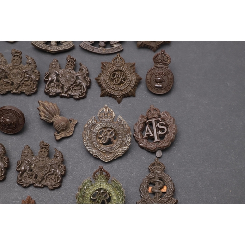 213 - A COLLECTION OF SECOND WORLD WAR ECONOMY ISSUE CAP AND OTHER BADGES. a collection of Second World Wa... 