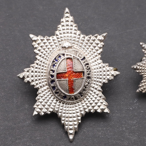 221 - A COLDSTREAM GUARD'S OFFICERS SILVER AND ENAMEL CAP BADGE AND ANOTHER. A Coldstream Guard's officers... 