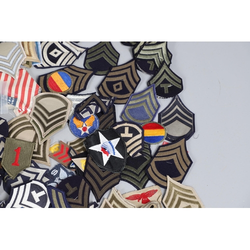 224 - AN EXTENSIVE COLLECTION OF ARMY AND AIR FORCE UNIFORM PATCHES AND RANK INSIGNIA. An extensive collec... 