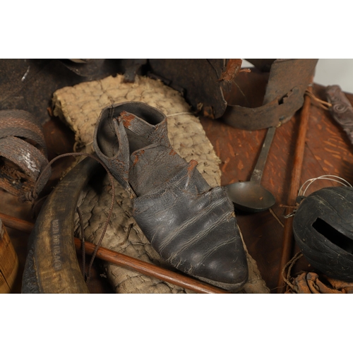 227 - AN UNUSUAL OAK SHIELD MOUNTED WITH MILITARY TROPHIES, CURIOSITIES AND OTHER ITEMS. An oak shield 89 ... 