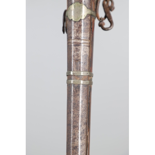 26 - A 19TH CENTURY MATCHLOCK LONG GUN. With a 119 cm barrel tapering from octagonal to round with decora... 