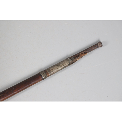 26 - A 19TH CENTURY MATCHLOCK LONG GUN. With a 119 cm barrel tapering from octagonal to round with decora... 