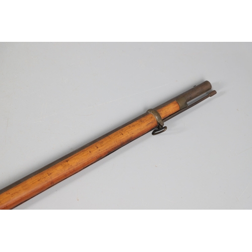 34 - AN 1856 PATTERN PERCUSSION FIRING RIFLE. With a 90 cm barrel with two band fixings, indistict  stamp... 