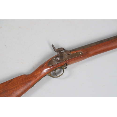 34 - AN 1856 PATTERN PERCUSSION FIRING RIFLE. With a 90 cm barrel with two band fixings, indistict  stamp... 