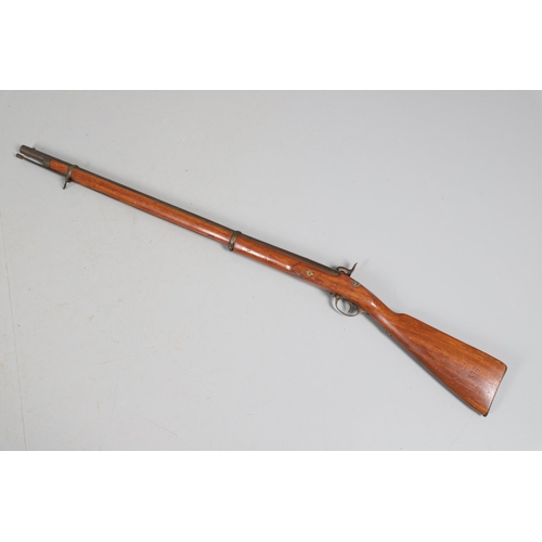 34 - AN 1856 PATTERN PERCUSSION FIRING RIFLE. With a 90 cm barrel with two band fixings, indistict  stamp... 